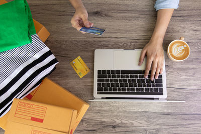 High angle view of woman using laptop