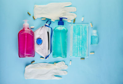 High angle view of blue bottles on table