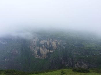 Scenic view of landscape in foggy weather