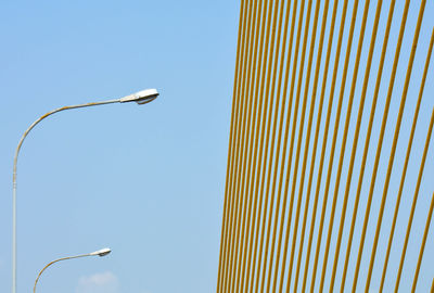 Low angle view of street light against sky