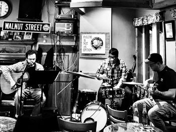 Group of people playing piano