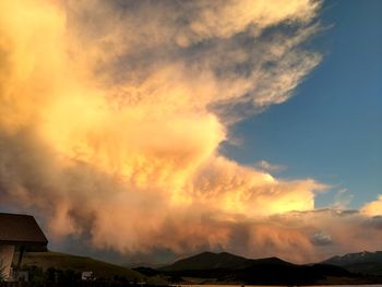 Scenic view of mountains against sky during sunset