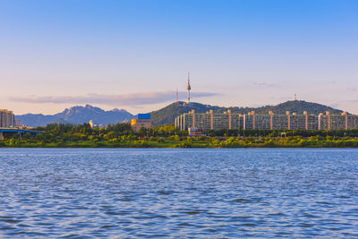 Scenic view of lake against blue sky