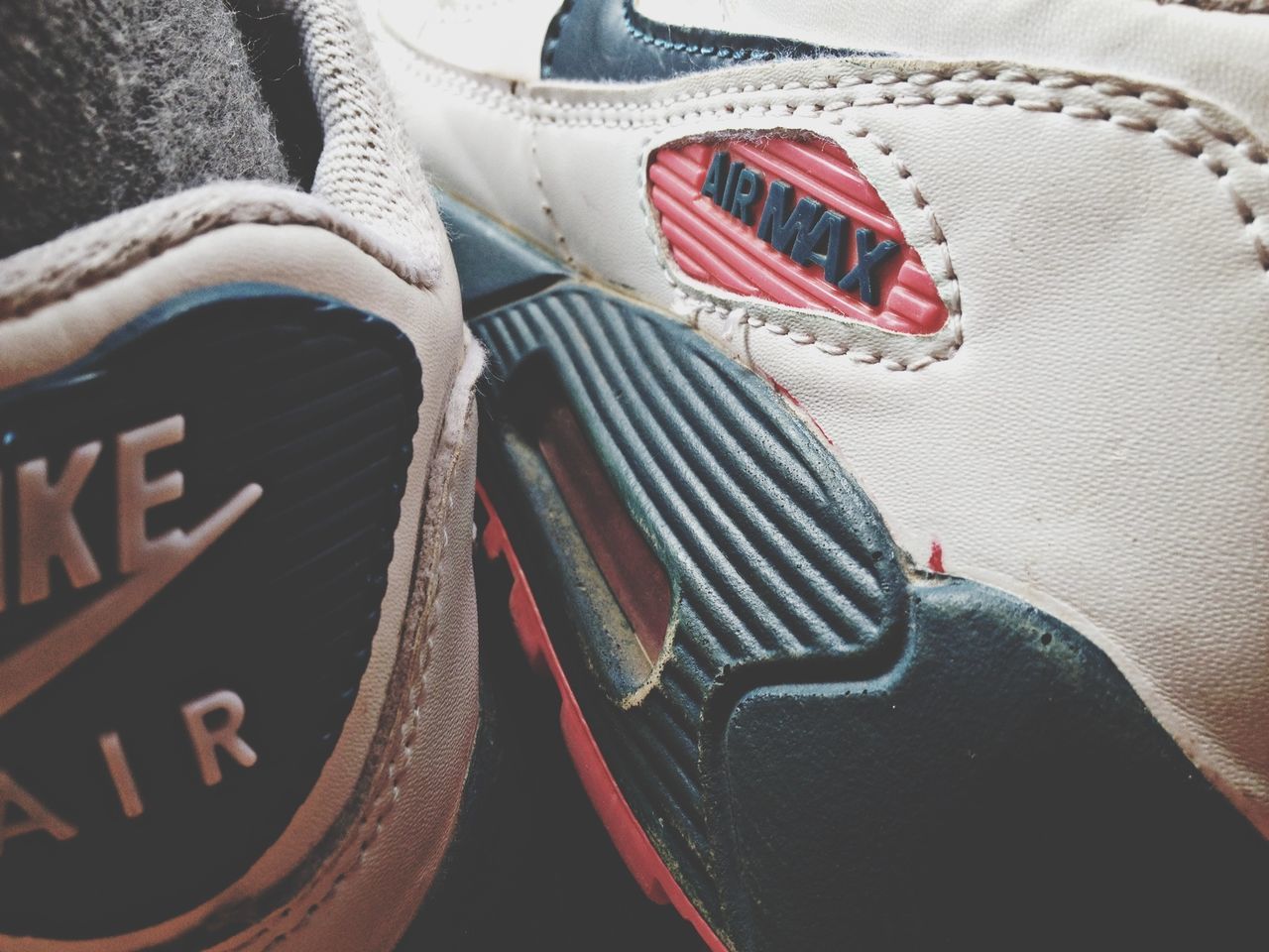 low section, shoe, person, footwear, high angle view, close-up, red, jeans, pair, fashion, transportation, part of, unrecognizable person, standing, canvas shoe, textile, indoors