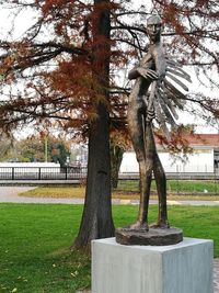 Statue of tree in park