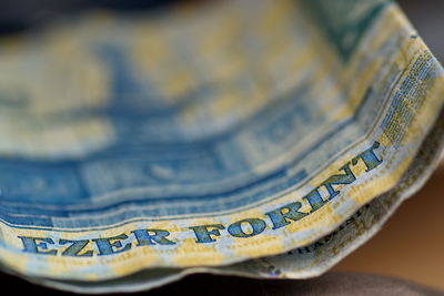 Close-up of coins on table