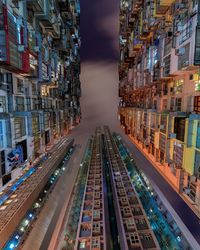 Illuminated city against sky