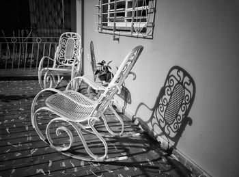 Empty chairs in abandoned building