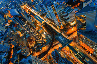 High angle view of city buildings at night