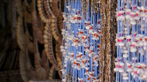 Close-up of multi colored coral hangings for sale in market