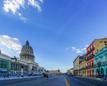 Buildings in city against sky