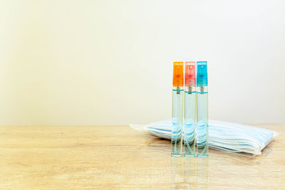 Close-up of drinking glass on table against white background