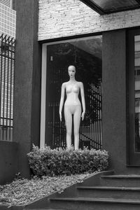 Statue of man outside building