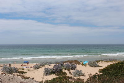 Scenic view of beach against sky