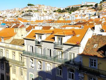 Houses against sky in city