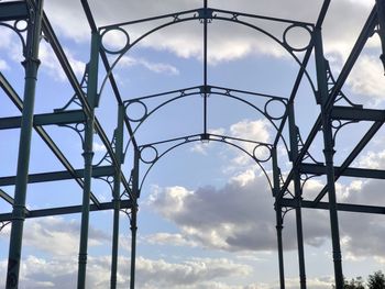 Low angle view of metallic structure against sky