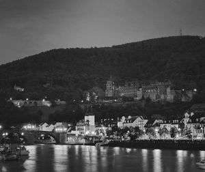 View of illuminated city at waterfront