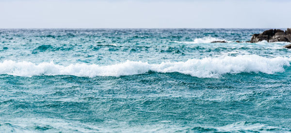 Scenic view of sea against clear sky