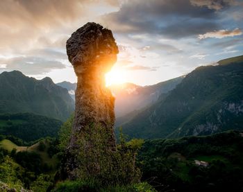 Scenic view of mountains against sky during sunset