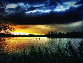 Scenic view of landscape against cloudy sky