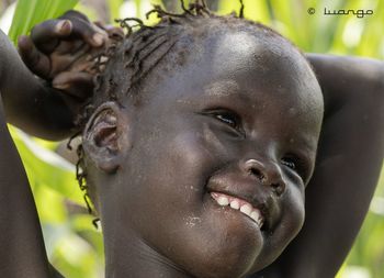 Close-up portrait of smiling woman