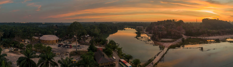 High angle view of river against sky at sunset