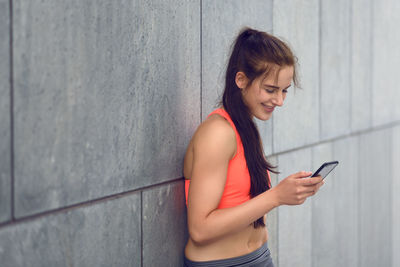 Young woman using mobile phone