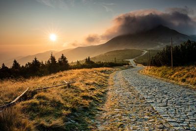 Scenic view of landscape against sky during sunset