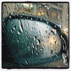 Close-up of water drops on glass