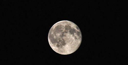 Low angle view of moon in sky