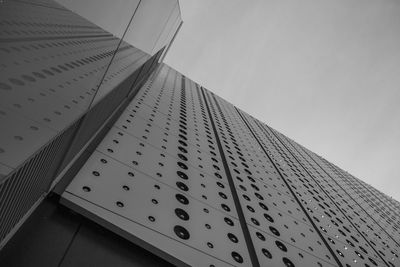 Low angle view of skyscraper against clear sky