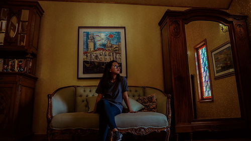 Woman sitting at home
