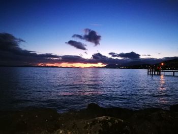 Scenic view of sea against clear sky during sunset