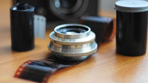 Close-up of camera on table