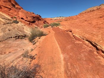 Scenic view of desert against clear sky