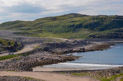 Scenic view of beach against sky