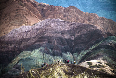 People walking on rocks