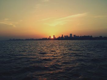 Scenic view of sea at sunset