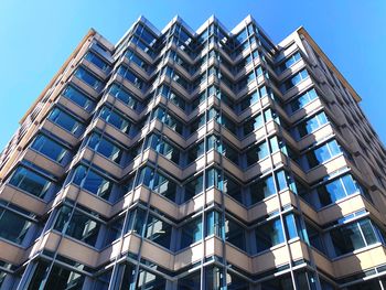 Low angle view of modern building against clear sky