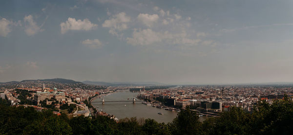 High angle view of river amidst buildings in city