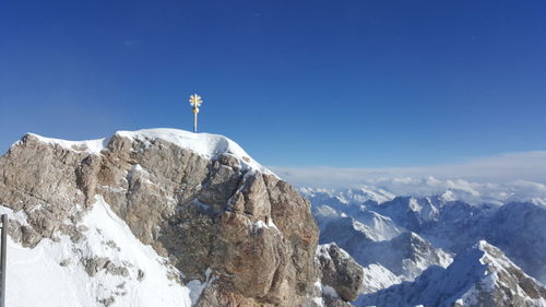 Low angle view of mountain range against clear sky