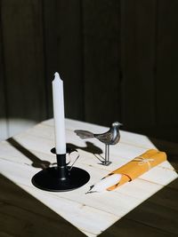 Close-up of candle on table