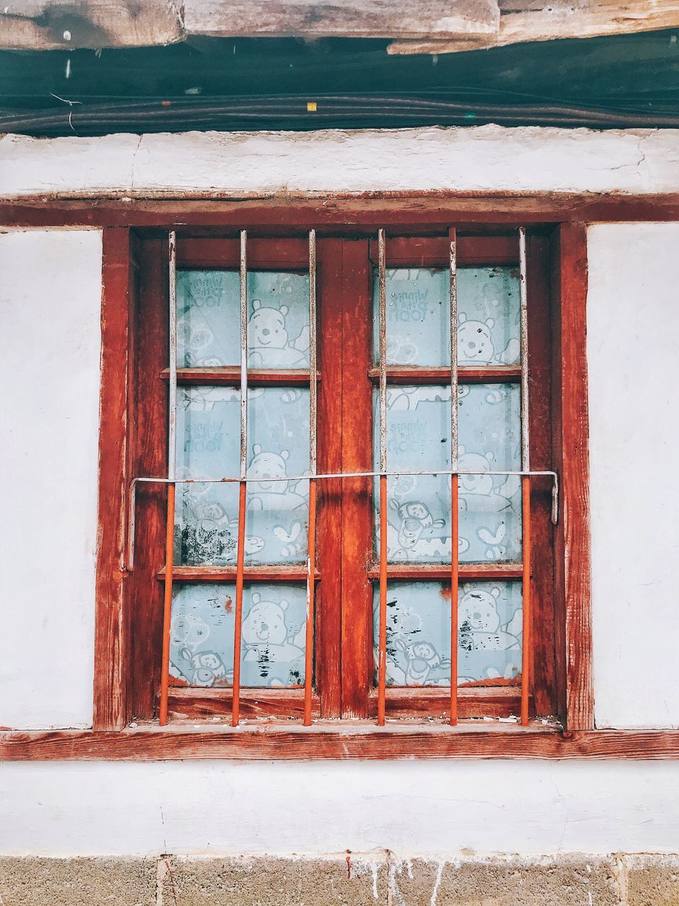window, architecture, built structure, red, wall, building exterior, blue, building, no people, house, wood, day, door, facade, closed, brick, wall - building feature, glass, old, outdoors, urban area, residential district, entrance, weathered, abandoned, window covering, security, protection, window frame, nature