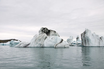 Scenic view of frozen sea against sky