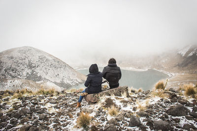 Scenic view of couple looking at view