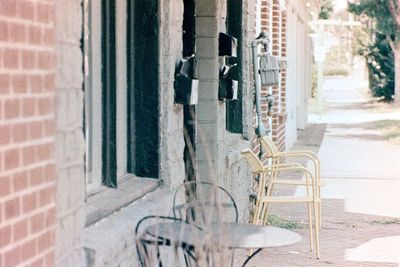 View of alley amidst buildings in city