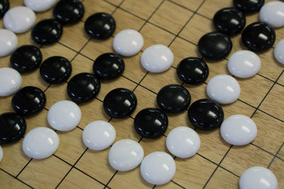 High angle view of black coffee beans on table