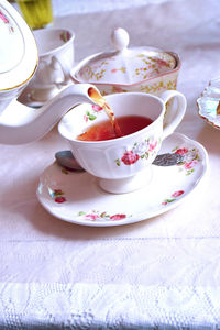 Close-up of tea cup on table