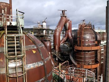 Panoramic view of factory against sky