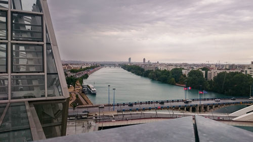 View of bridge over river in city